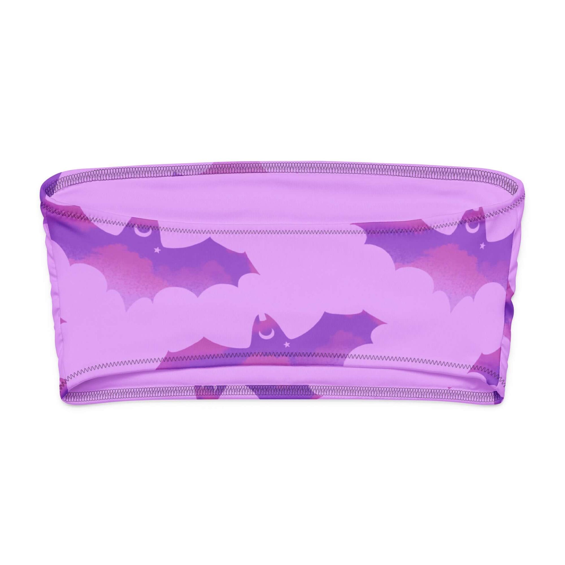 Aensland bandeau bikini top in purple with playful bat print, perfect for tanning and lounging.
