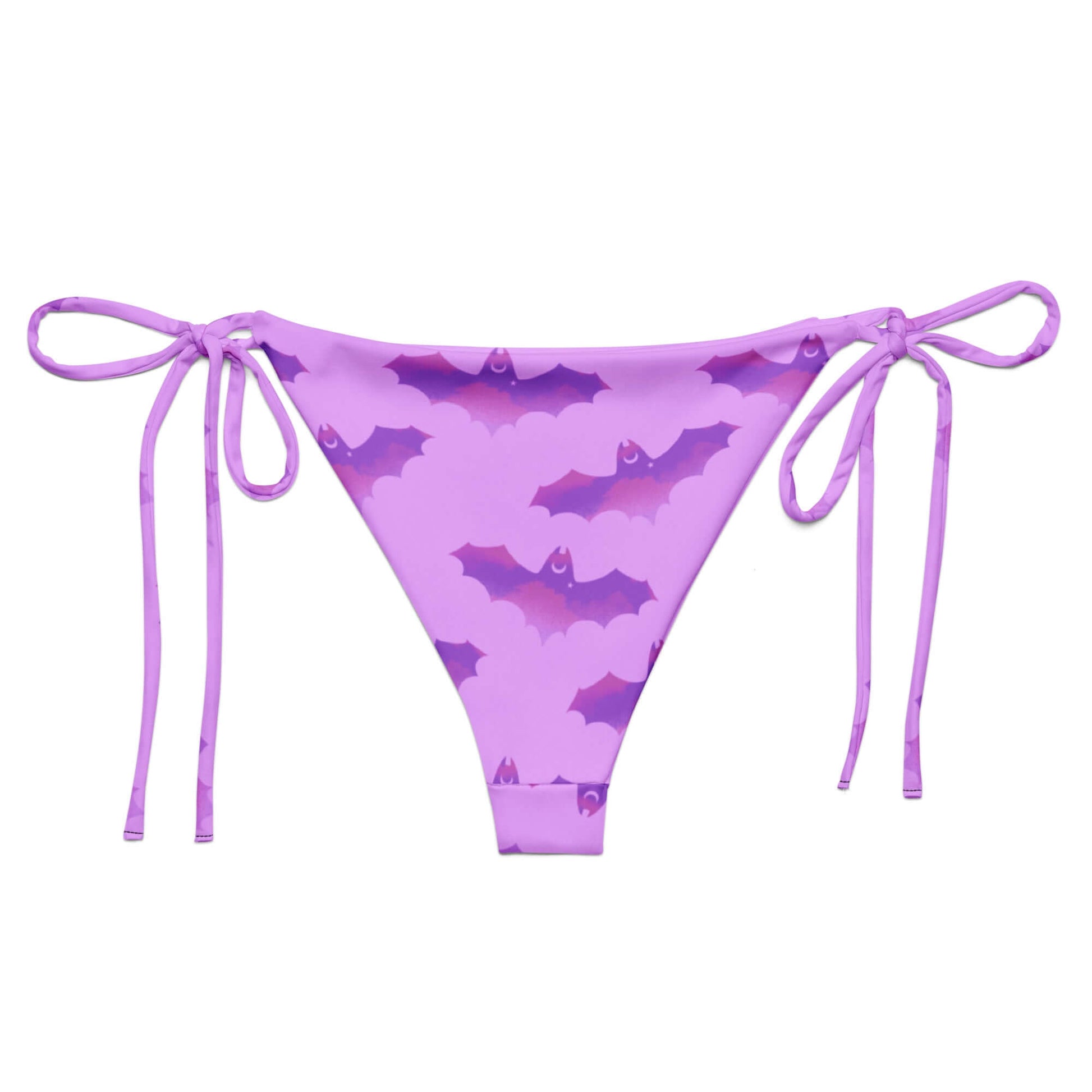 Aensland String Bikini Bottom in playful purple bat print, perfect for sunbathing by the pool this summer.