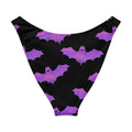 Aensland V-cut bikini bottom featuring a playful bat pattern in purple and black for a fun beach vibe.