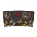 Gothic Tea Time bandeau bikini top with whimsical skeletons, butterflies, and floral designs on a dark background.