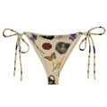 Gothic Tea Time String Bikini Bottom features a unique floral and skeleton design, perfect for stylish summer lounging.