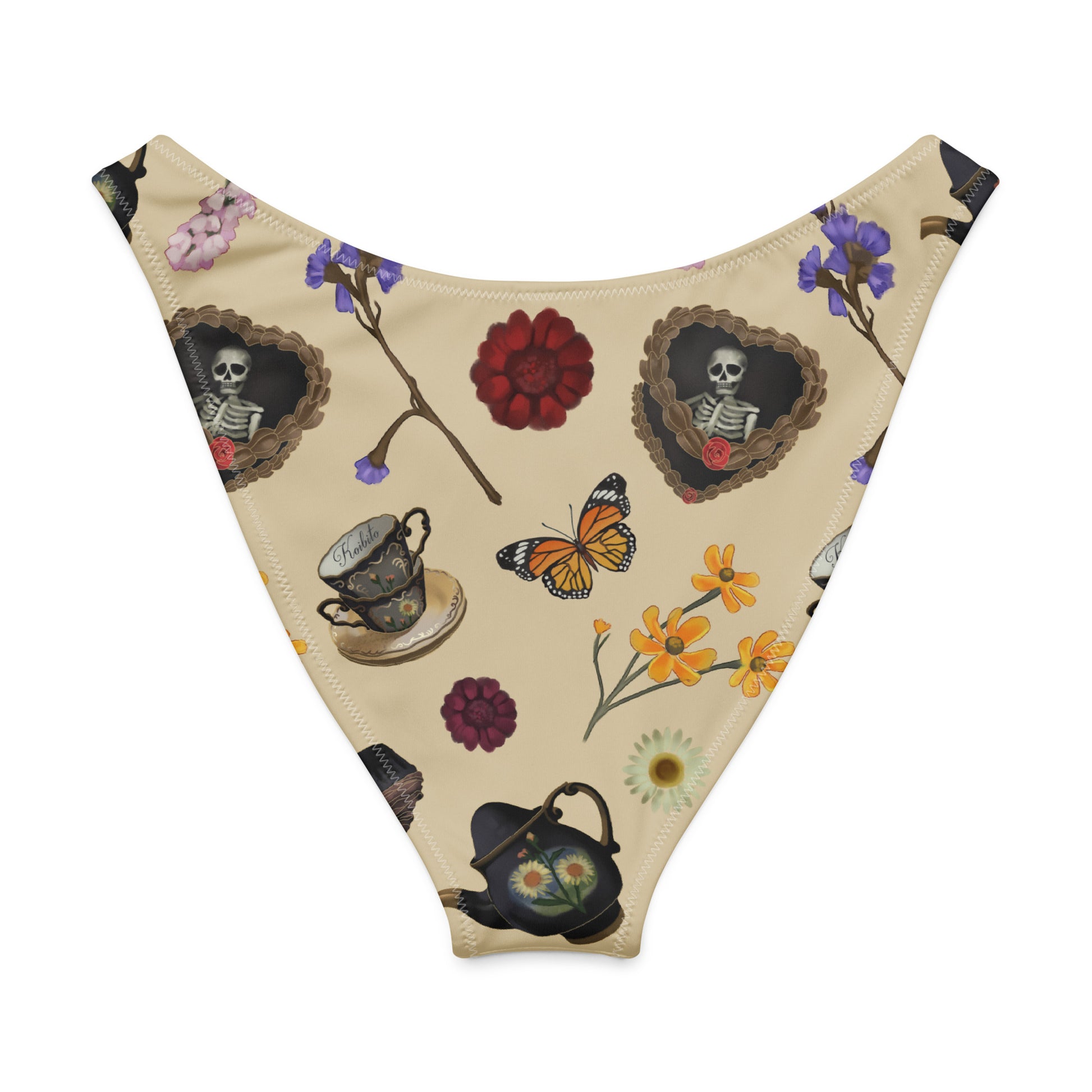 Gothic V-cut bikini bottom with playful tea time and skeleton art, perfect for stylish beach days.
