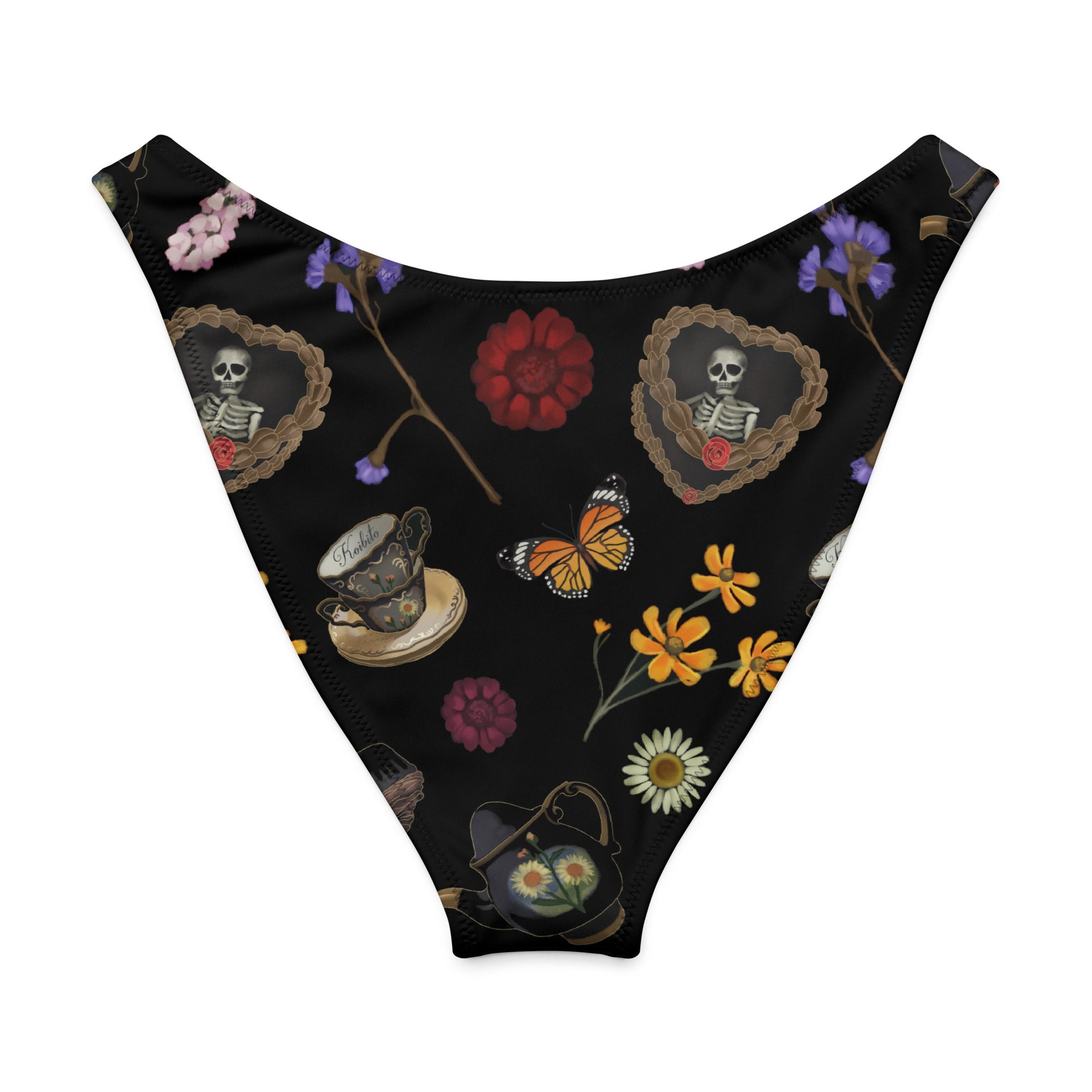 Gothic tea time V-cut bikini bottom with floral and skeleton designs on a black background.