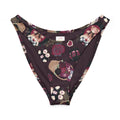 Gothic Teddy V-cut bikini bottom featuring floral patterns, high-leg cut, and recycled fabric for comfort and sun protection.