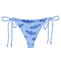 Lilith String Bikini Bottom in playful blue with bat design, perfect for summer poolside relaxation. UPF 50+ protection.