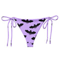 Morrigan String Bikini Bottom features a fun bat design, perfect for summer poolside lounging. Enjoy stylish comfort!