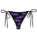 Morrigan String Bikini Bottom features a fun bat design, perfect for stylish sunbathing this summer.