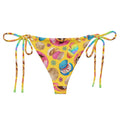 Bright and colorful Pan Dulce String Bikini Bottom, perfect for sunbathing and poolside relaxation this summer.