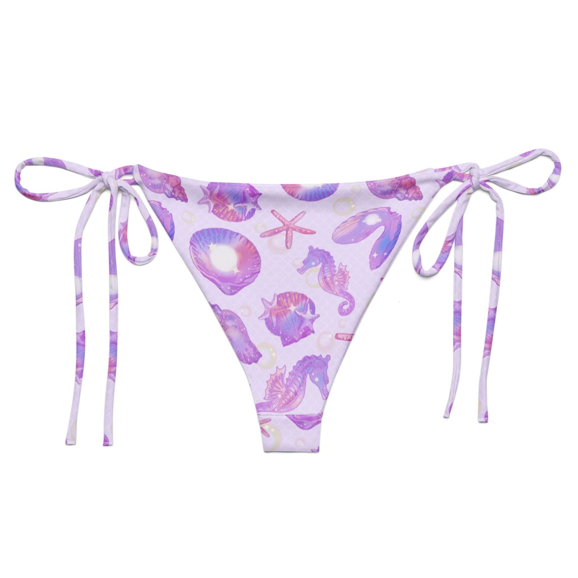 Enjoy the sun in the Sea Princess String Bikini Bottom, featuring a vibrant shell design and adjustable ties.