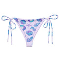 Stylish Sea Princess String Bikini Bottom featuring vibrant seashell print, perfect for poolside relaxation this summer.