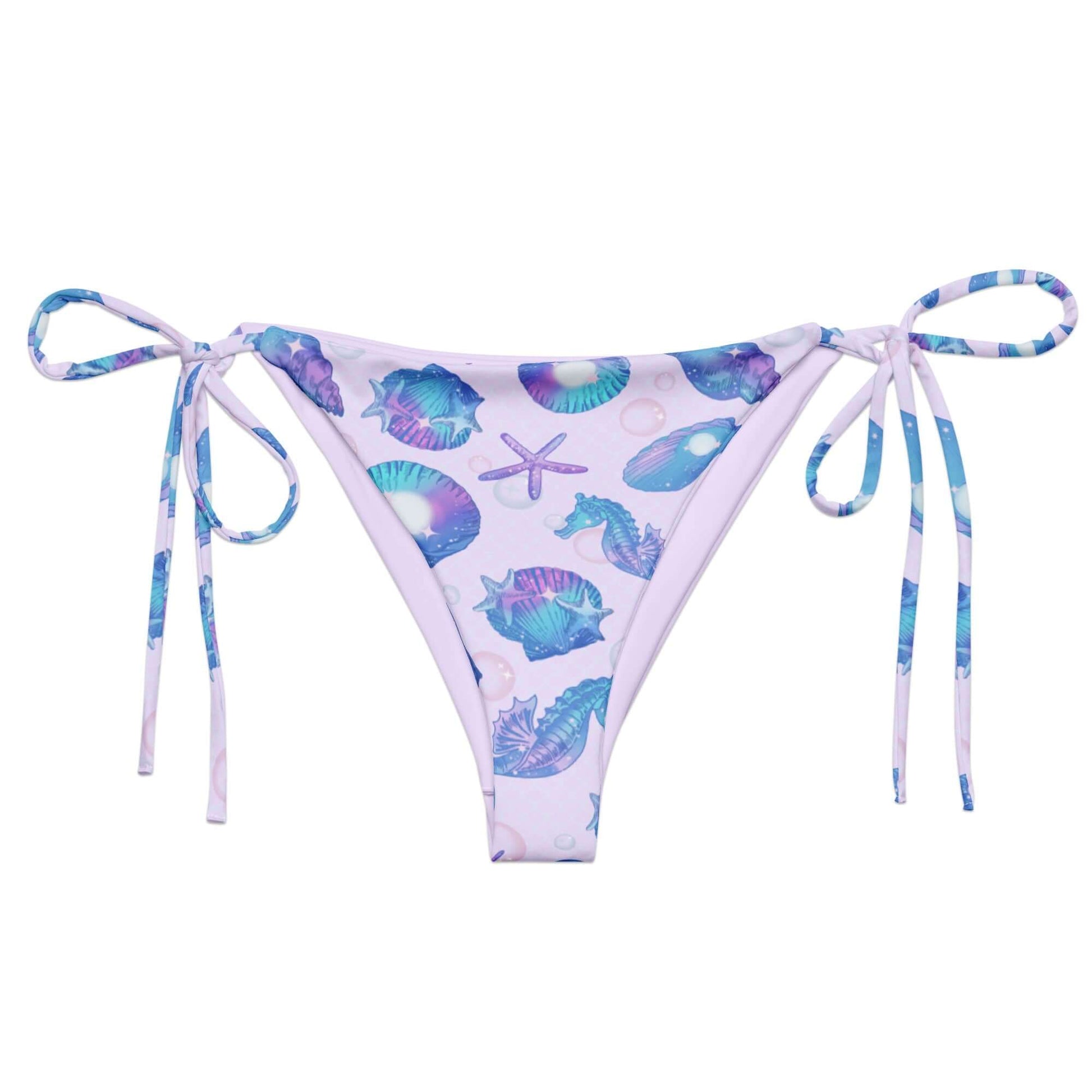 Stylish Sea Princess String Bikini Bottom featuring vibrant seashell print, perfect for poolside relaxation this summer.