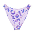 V-cut bikini bottom featuring a vibrant sea-themed pattern with seahorses and shells on a soft lavender background.