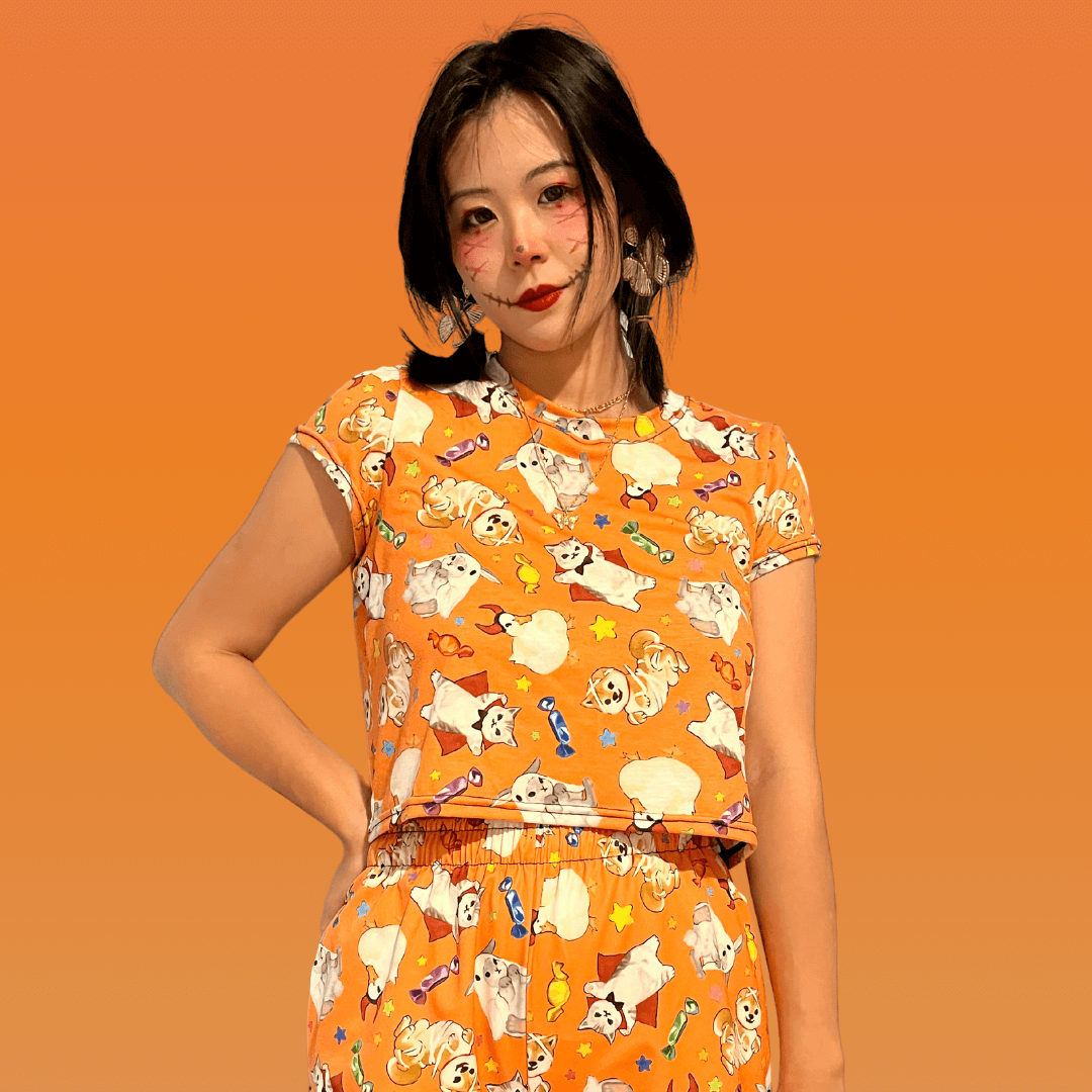 Bright and playful Trick or Treaters Crop Top, perfect for Halloween fun or cozy everyday wear year-round.