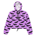 Aensland cropped windbreaker in vibrant purple with bat print, perfect for lightweight, waterproof adventures.