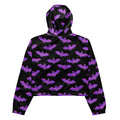 The Aensland cropped windbreaker features a stylish bat design, perfect for outdoor adventures in any weather.