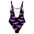 Stylish Aensland One-Piece Swimsuit featuring a fun bat and cloud design, perfect for a bold beach look.