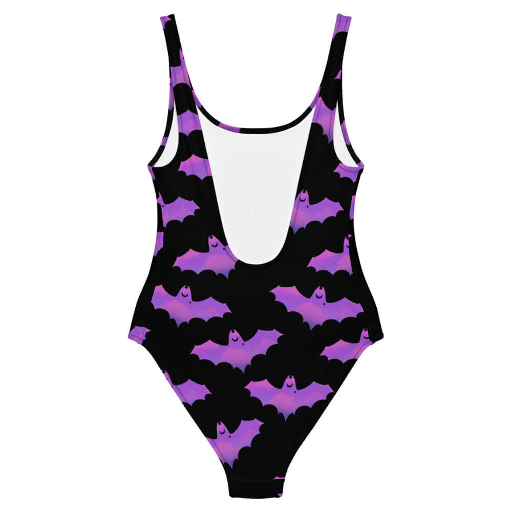 Stylish Aensland One-Piece Swimsuit featuring a fun bat and cloud design, perfect for a bold beach look.