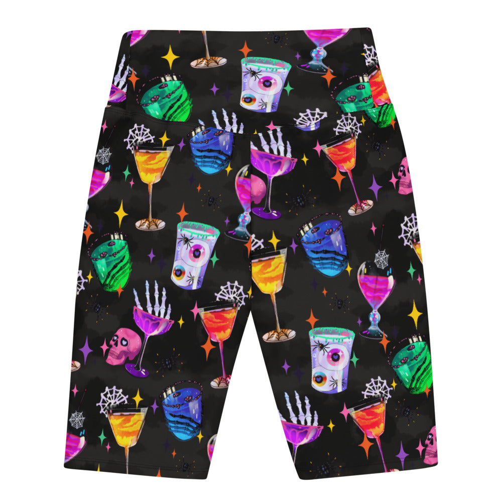 High-waisted Monster Party Biker Shorts feature vibrant drink and monster graphics, perfect for workouts or fun outings.
