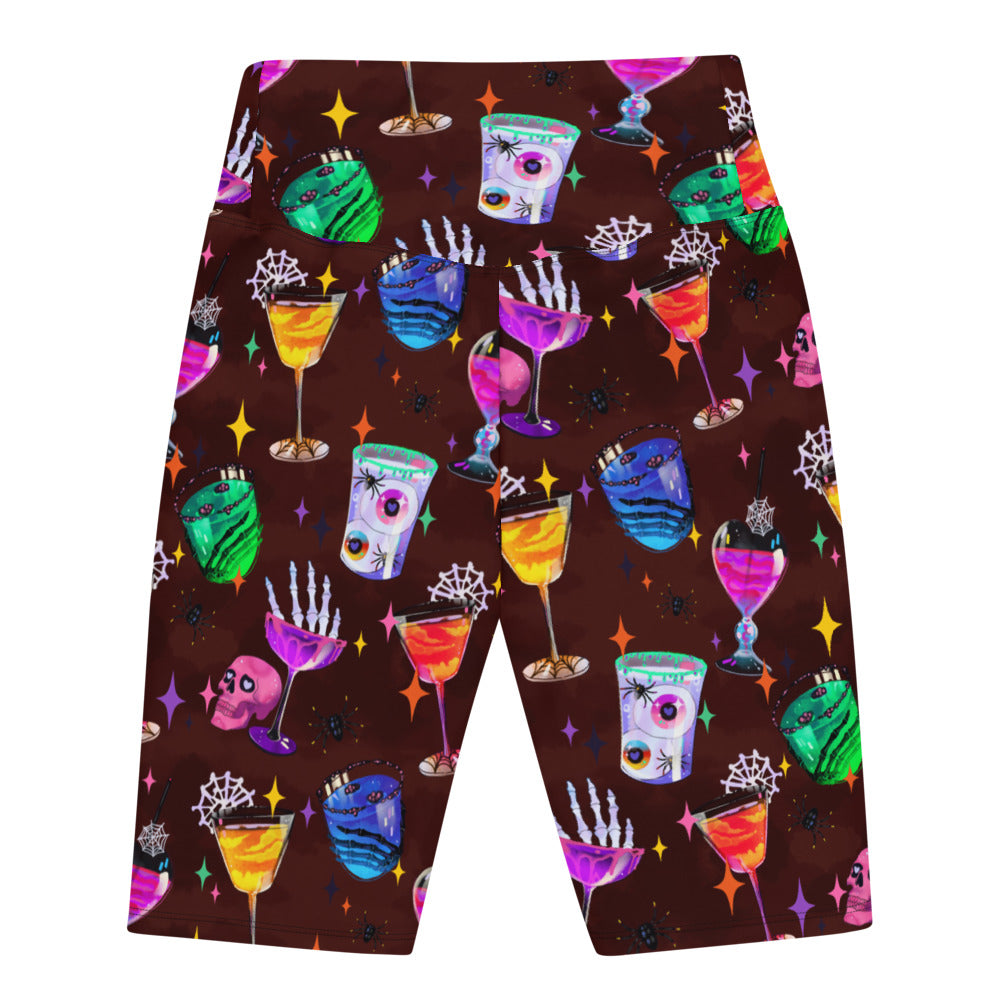 High-waisted Monster Party Biker Shorts featuring fun drink and monster prints, perfect for stylish workouts.