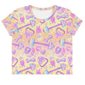 Vibrant Glitter Gains Crop Top featuring pastel colors and fitness motifs, perfect for stylish workouts.