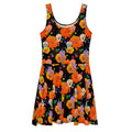 Vibrant Sugar Skull Skater Dress featuring colorful skulls and flowers, perfect for fun days in the sun.