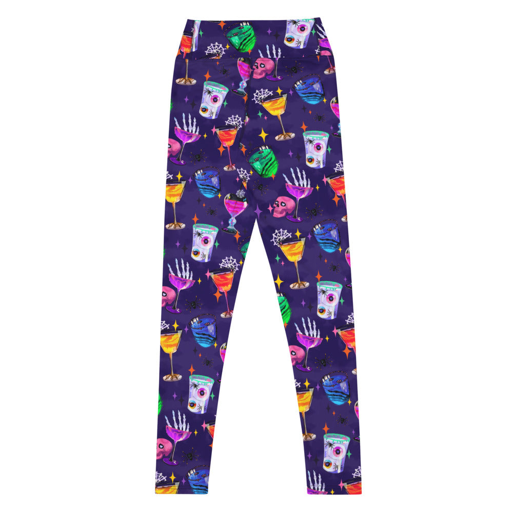 High-waisted Monster Party Leggings feature a vibrant Halloween design, perfect for workouts and spooky celebrations.