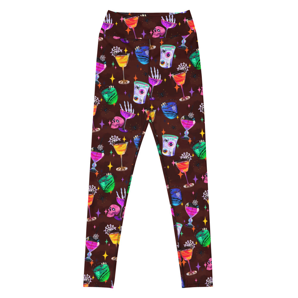 High-waisted Monster Party Leggings feature vibrant designs, perfect for workouts and Halloween festivities.