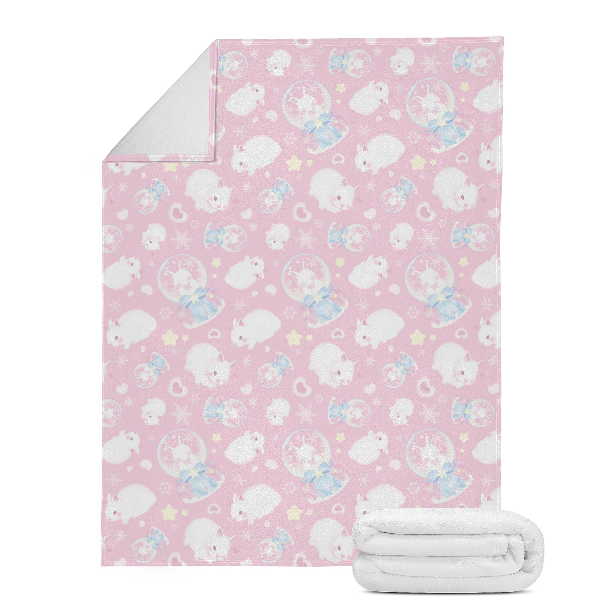 Cozy up with the Snow Bunny Blanket (Pink), featuring soft suede and micro fleece for warmth and comfort.