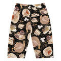 Café Biker Shorts featuring a stylish print of coffee cups and desserts, perfect for comfort and trendy outfits.