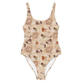 Enjoy the sun in the stylish Café One-Piece Swimsuit featuring a charming pastry and tea design. Perfect for beach days!