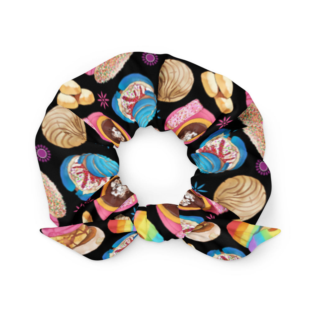 Colorful Pan Dulce Scrunchie featuring sweet baked treats, perfect for adding style to any outfit. Get yours today!