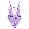Stylish Axolotl One-Piece Swimsuit featuring cute axolotls on a vibrant purple background, perfect for summer fun.