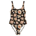 Stylish Café One-Piece Swimsuit featuring elegant tea and pastry prints, perfect for the beach or pool.