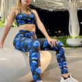 Stylish Enchanted Rose Leggings featuring elegant blue rose patterns, perfect for workouts or casual outings.