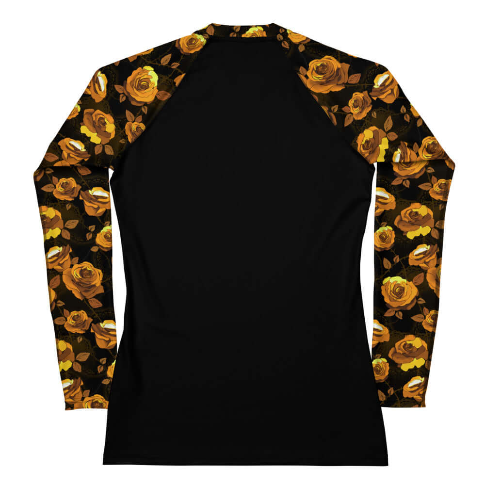Enchanted Rose Rash Guard features a floral design, perfect for active wear and sun protection during sports.
