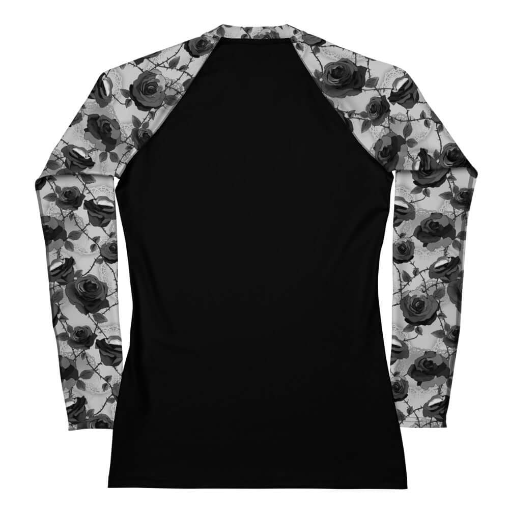 Stylish Enchanted Rose Rash Guard featuring floral sleeves, perfect for active days outdoors and sun protection.