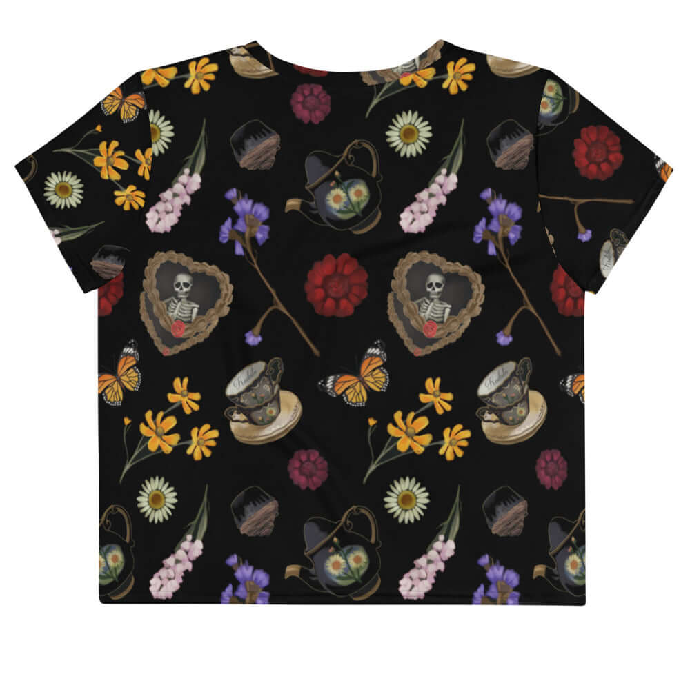 Stylish Gothic Tea Time Crop Top features a whimsical floral and tea motif, perfect for unique tea time gatherings.
