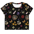 Express your style with the Gothic Tea Time Crop Top, featuring dark floral patterns and quirky tea motifs.