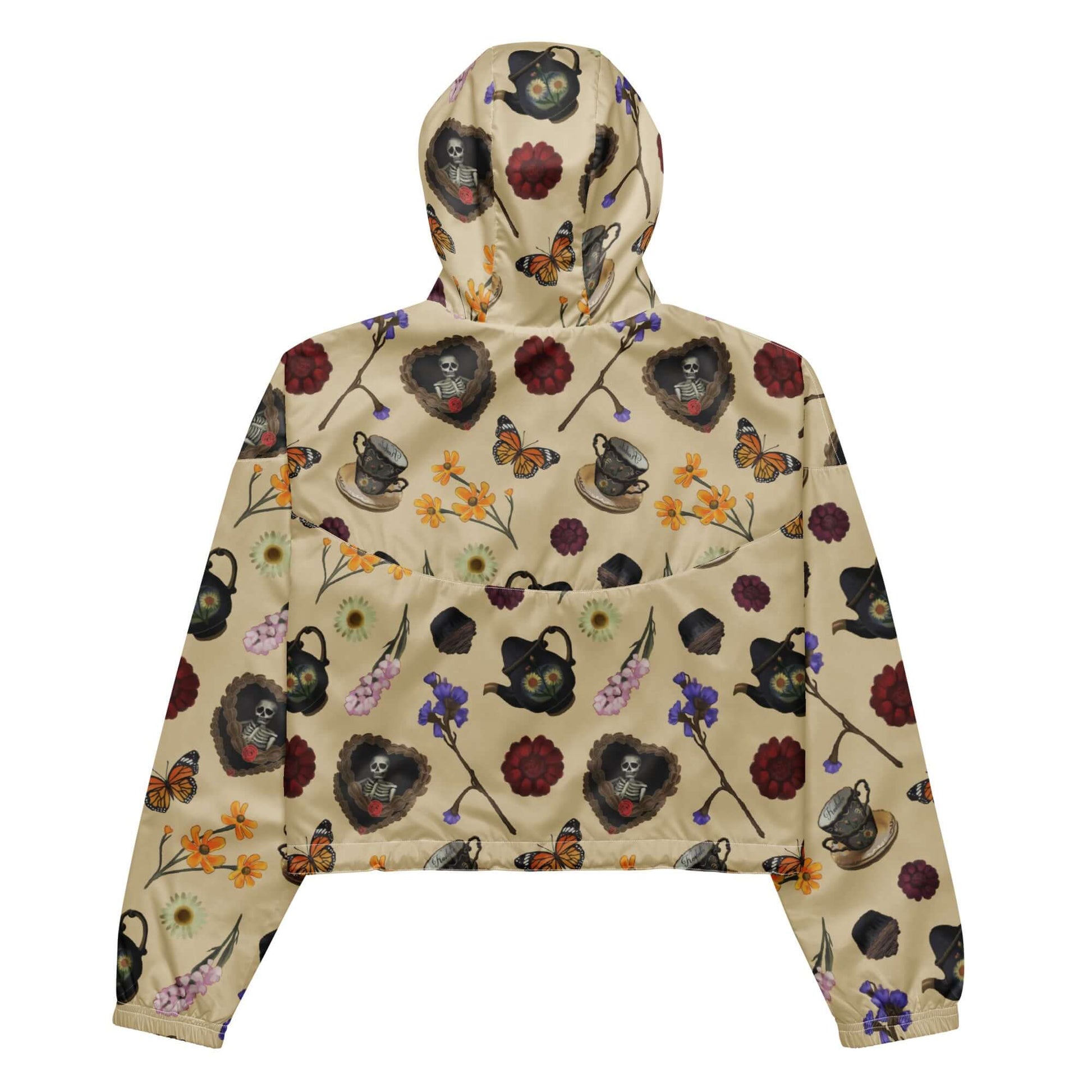 Lightweight and waterproof, the Gothic Tea Time cropped windbreaker features a unique floral design and practical side pockets.