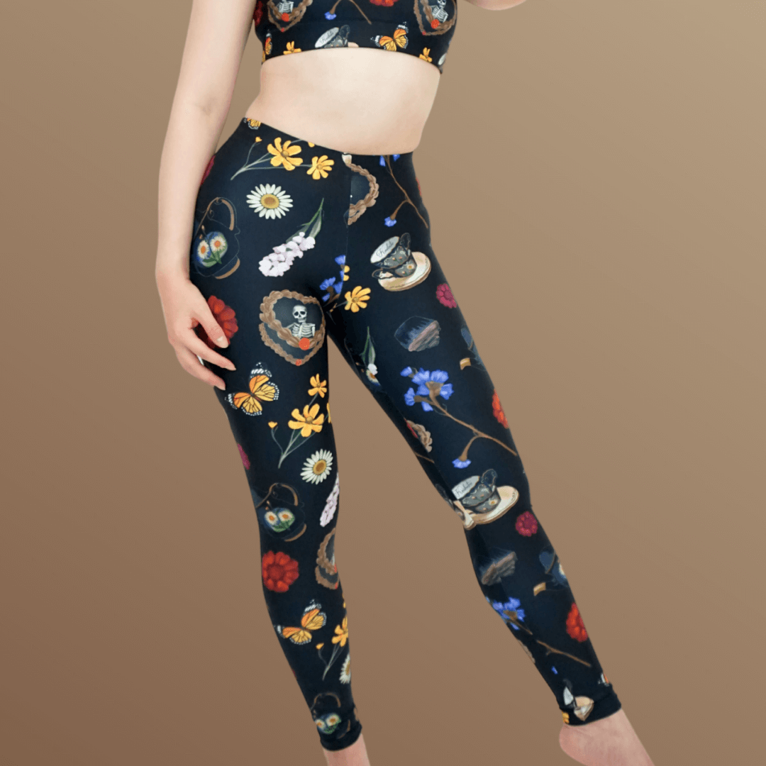 Gothic Tea Time Leggings feature a floral and tea ware design, perfect for adding a goth touch to your outfit.