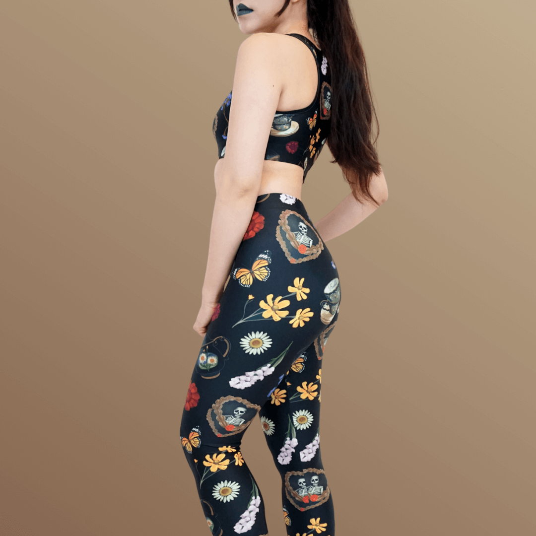 Experience elegance in the Gothic Tea Time Leggings, featuring floral and tea ware designs for a stylish goth look.