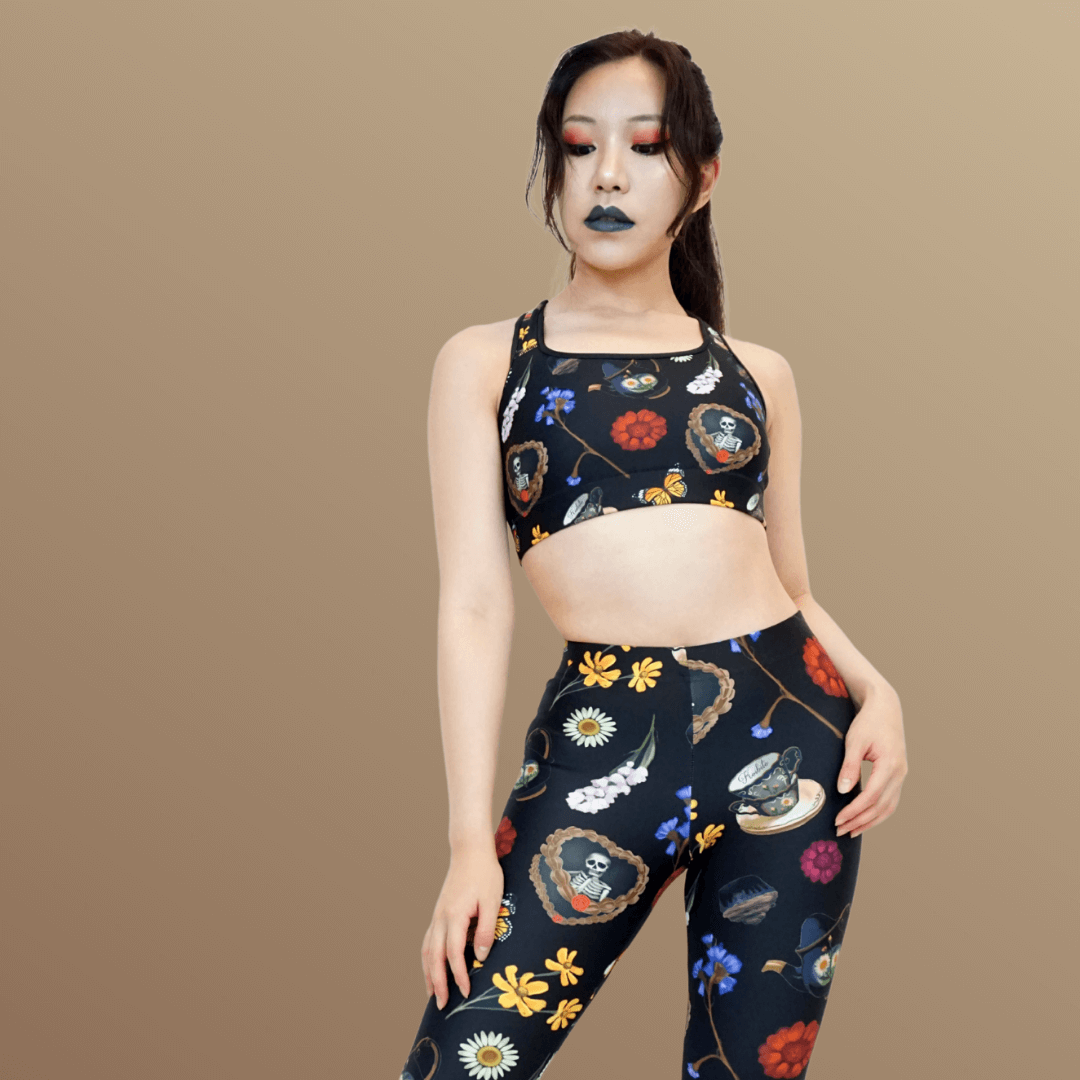 Stylish Gothic Tea Time Sports bra featuring floral designs, perfect for adding personality to workouts.