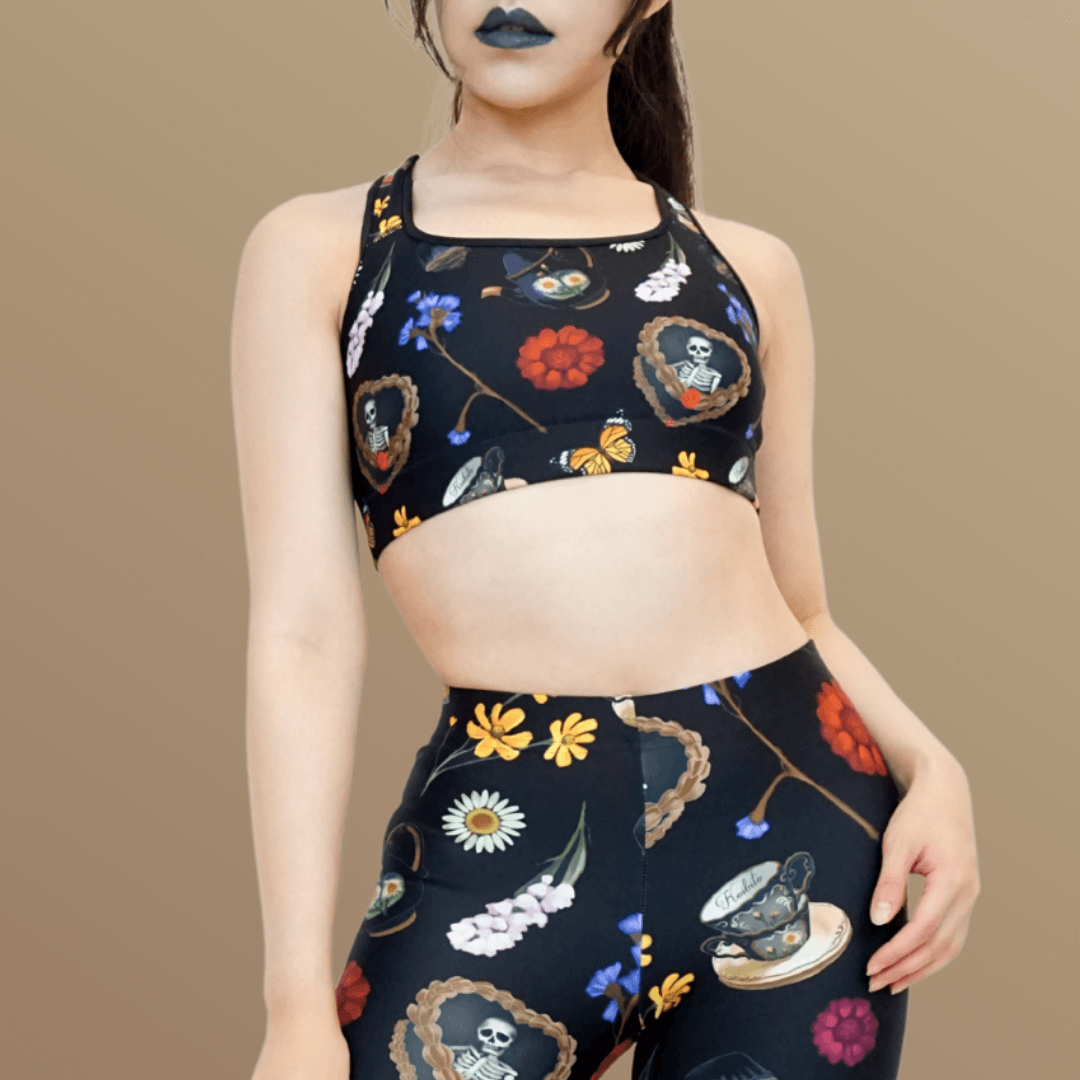 Gothic Tea Time Sports bra features whimsical floral and butterfly design, perfect for showcasing personality during workouts.