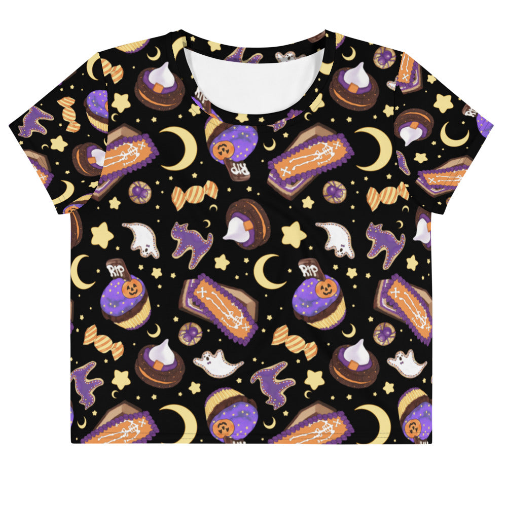 Stylish Halloween Treat Crop Top featuring sweet treats and a starry night design for a festive look. Perfect for spooky season!