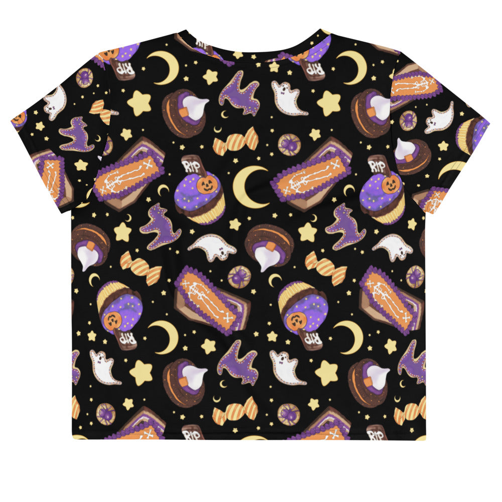Stylish Halloween Treat Crop Top featuring a fun pattern of spooky sweets and stars, perfect for festive occasions.