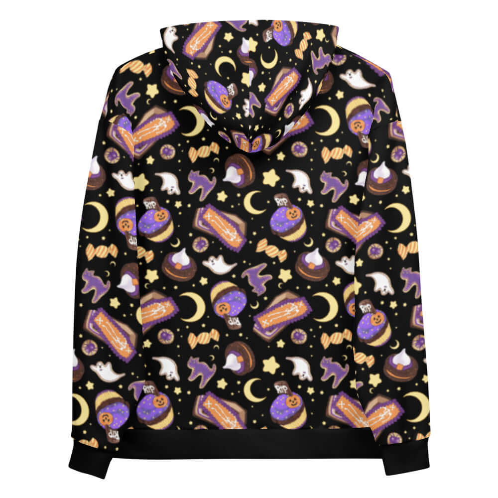 Cozy Halloween Treat Hoodie featuring a vibrant print of spooky sweets against a starry night background.