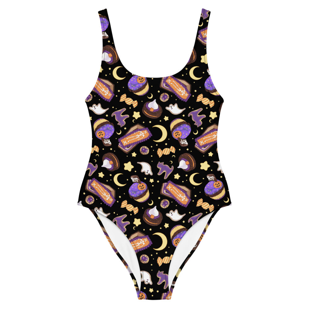 Stylish Halloween Treat One-Piece Swimsuit featuring fun spooky designs, perfect for a festive beach day.