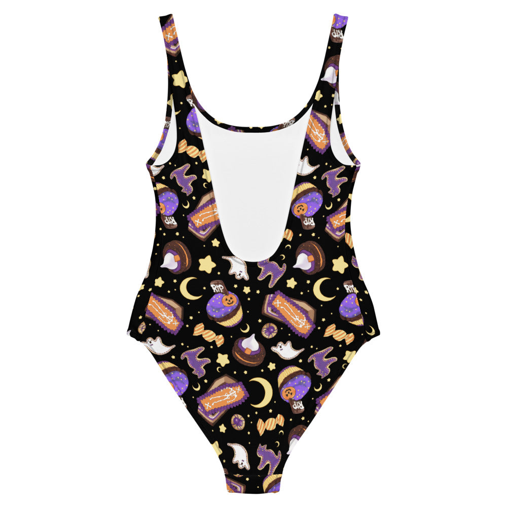 Stylish Halloween Treat One-Piece Swimsuit featuring fun spooky designs for a perfect beach look. Ideal for all figures!