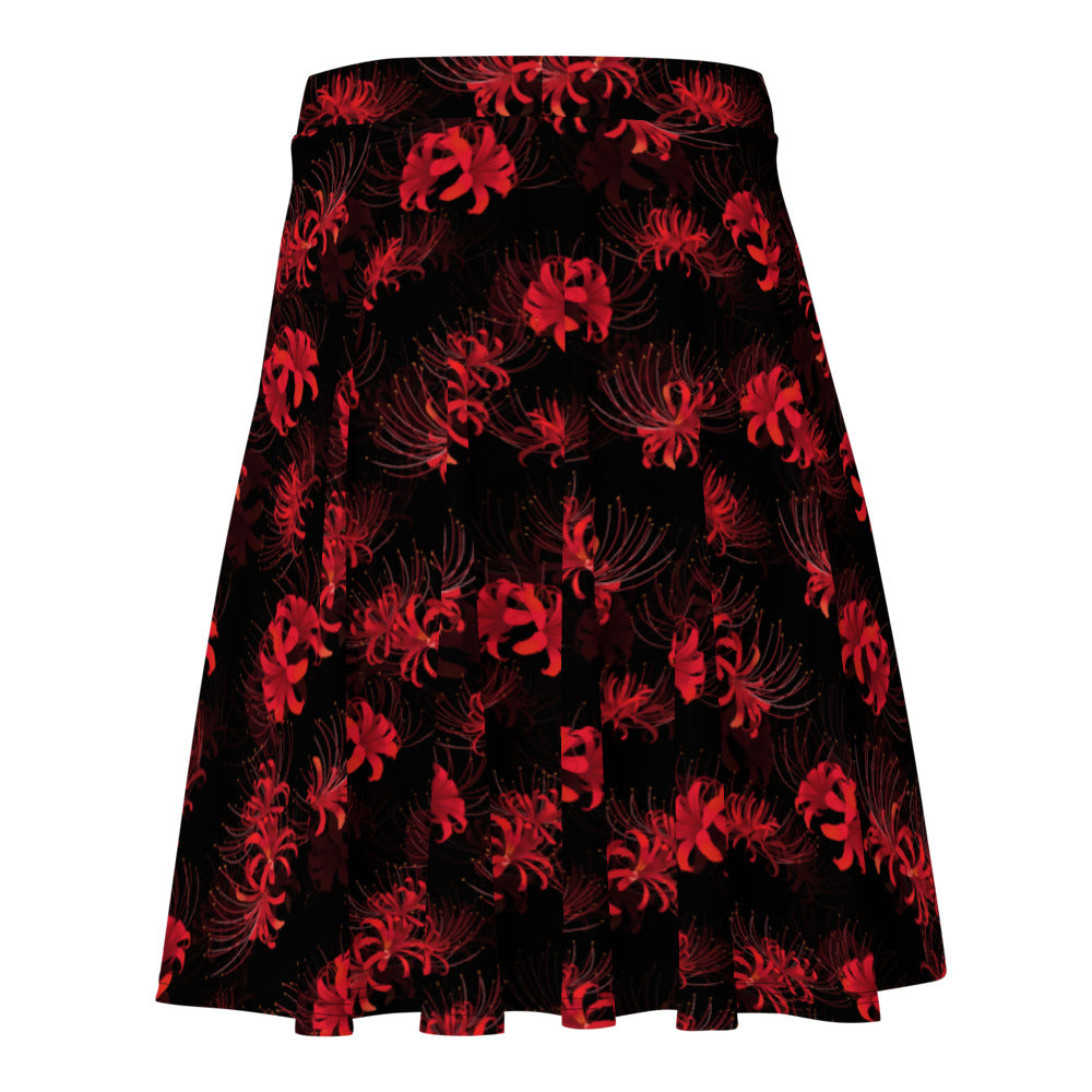 Stylish Higanbana Skater Skirt in bold red floral design, perfect for adding an edgy touch to any outfit.