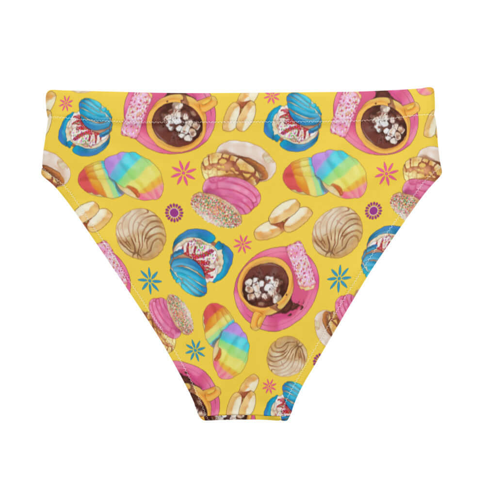 High-waisted Pan Dulce Bikini Bottom features a colorful baked goods print, perfect for beach fun or spa days.
